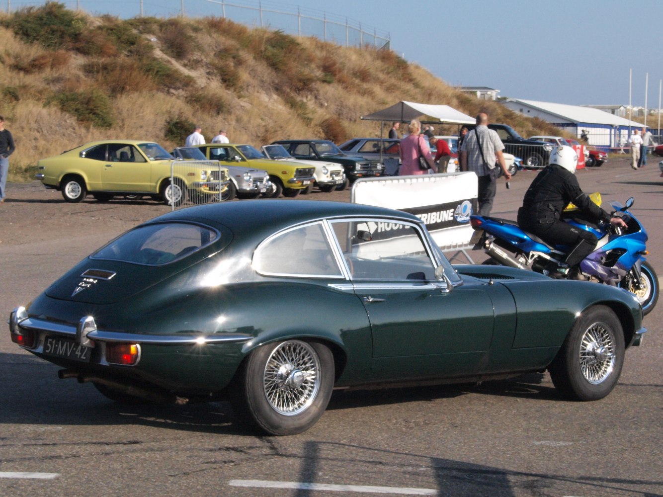 Classic coupe with smooth curves and wire wheels