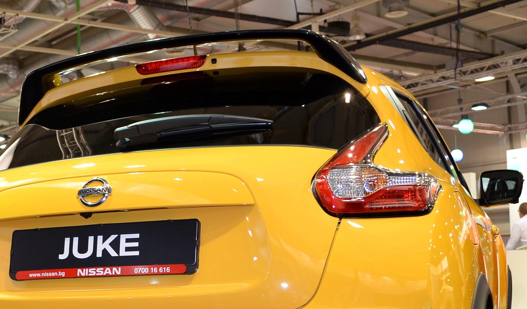 Rear hatch with spoiler and uniquely shaped taillight