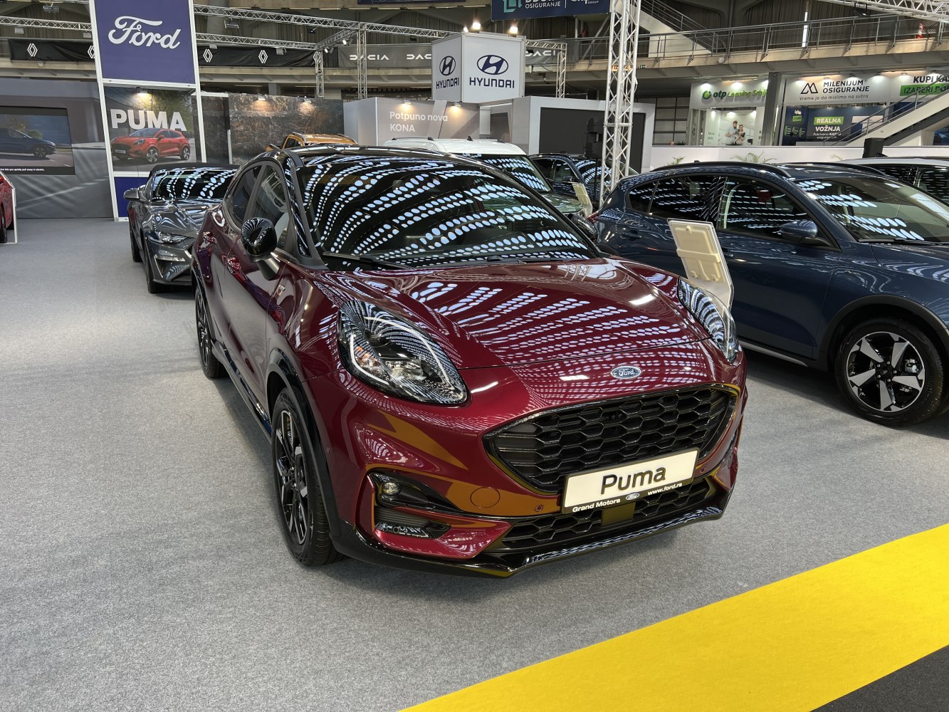 Front view with distinctive grille and sleek LED headlights