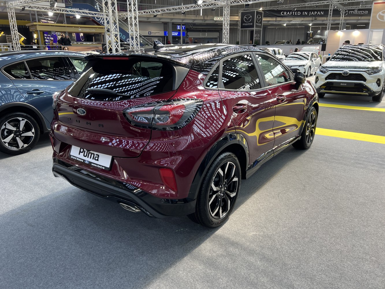 Rear view with taillights and alloy wheels