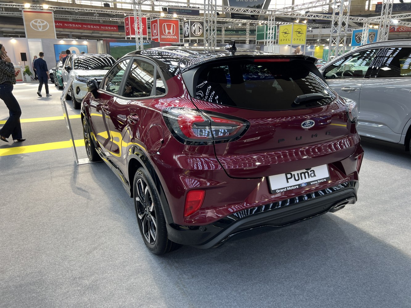 Stylish rear of a compact SUV with distinctive LED tail lights and sleek body lines.