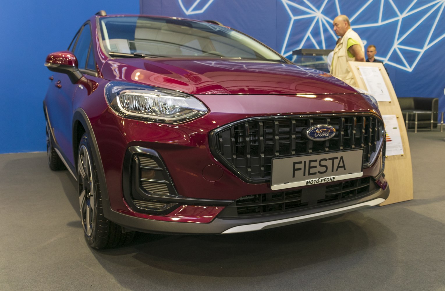 Front view with distinctive grille and sleek headlights