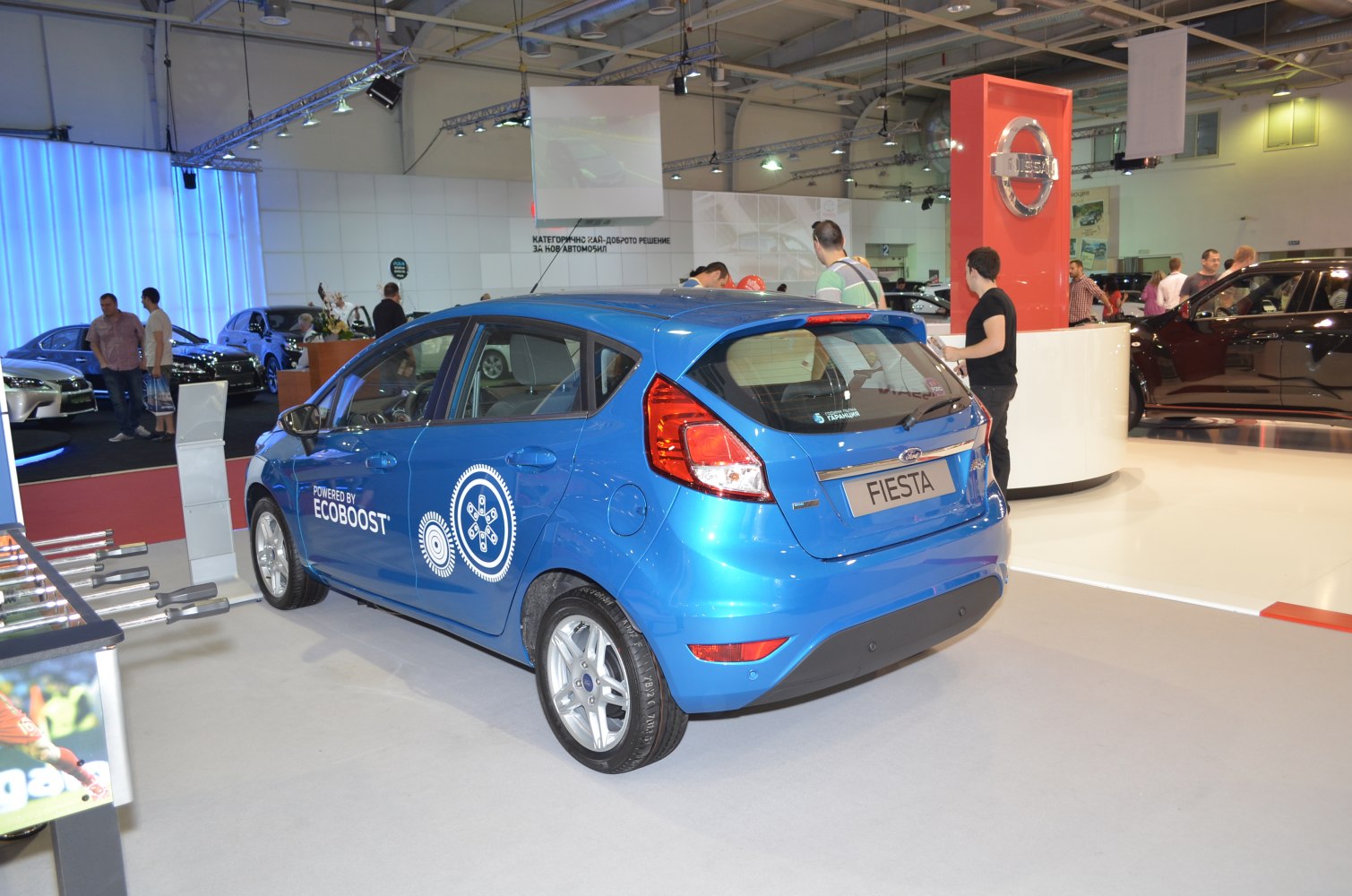 Blue five-door hatchback with EcoBoost graphics and rear light cluster