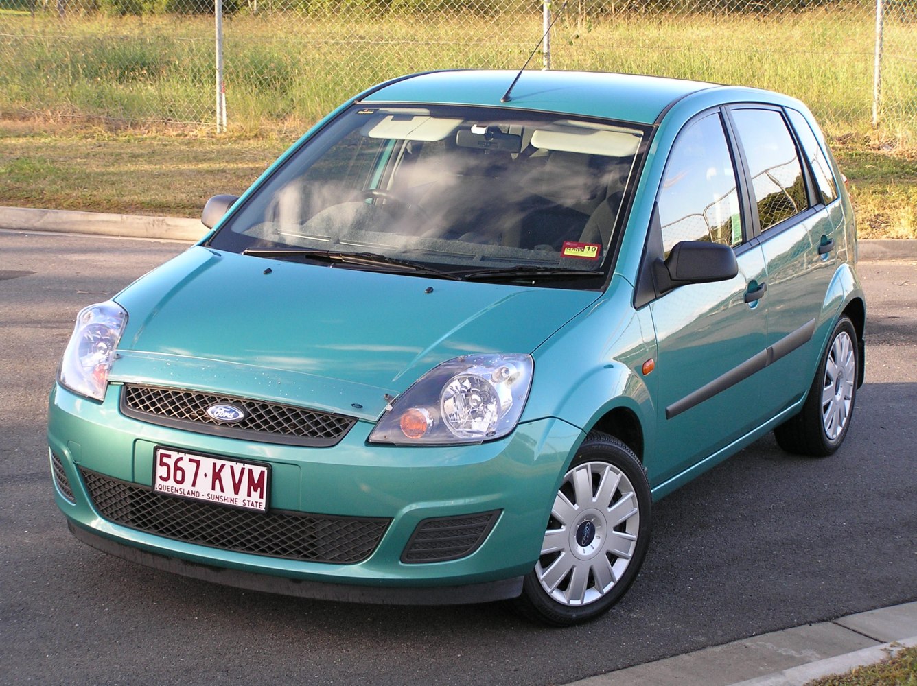Compact 5-door hatchback with distinct front grille and large headlights