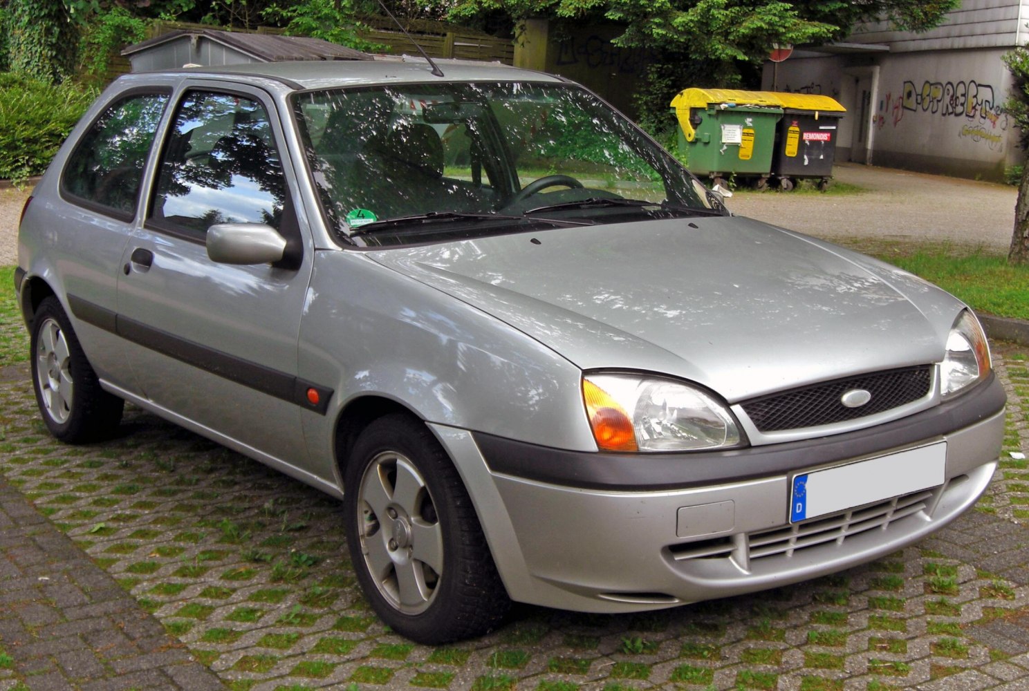 Silver small hatchback front-side angle view