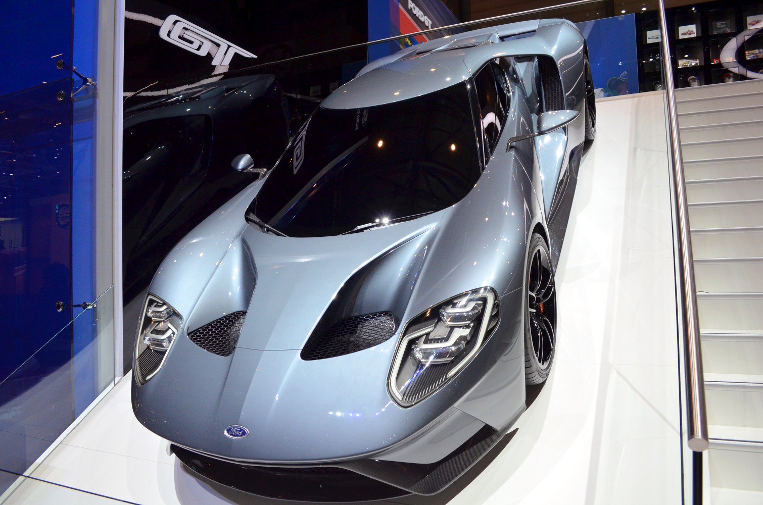 Silver supercar with aerodynamic curves and LED headlights