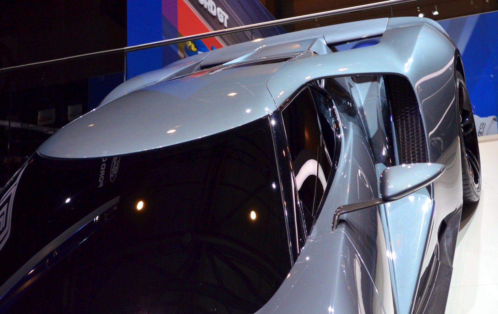 Sleek aerodynamic body with side mirror and windshield view