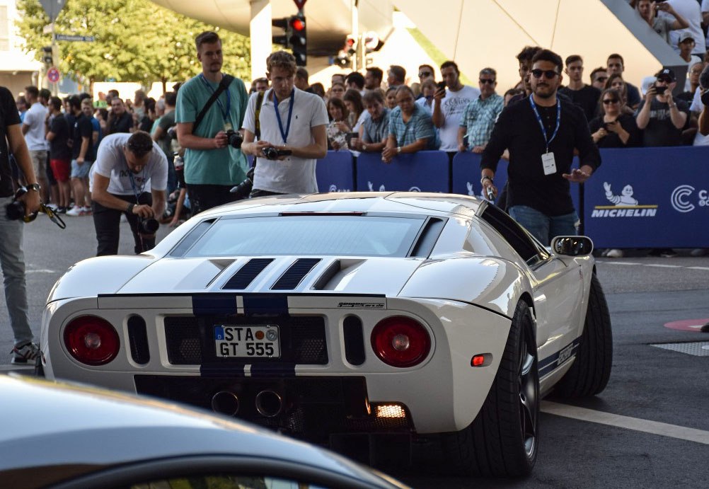 Rear view with signature racing stripes and round taillights