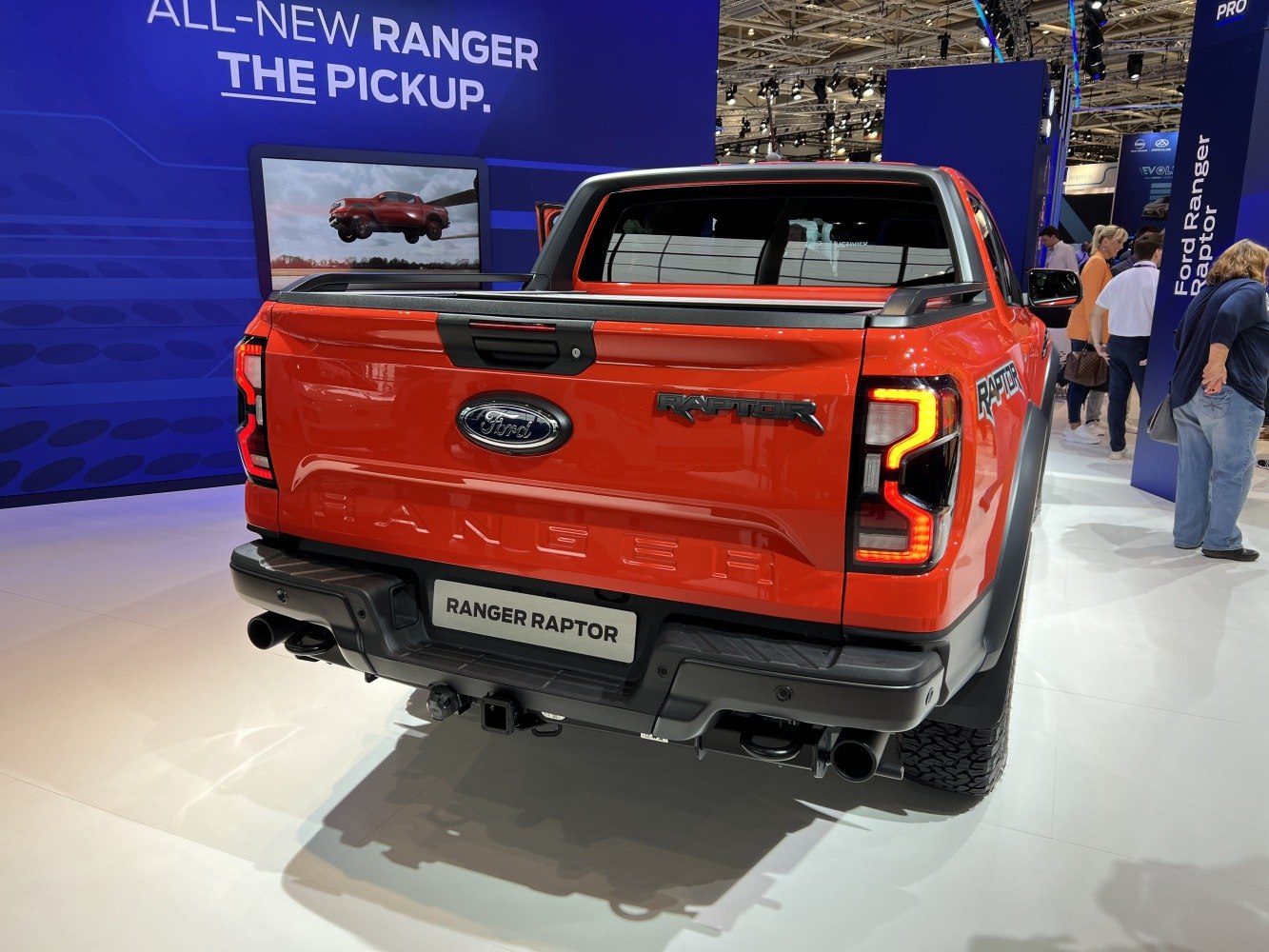 Rear view of pickup with bold taillights and Raptor badge