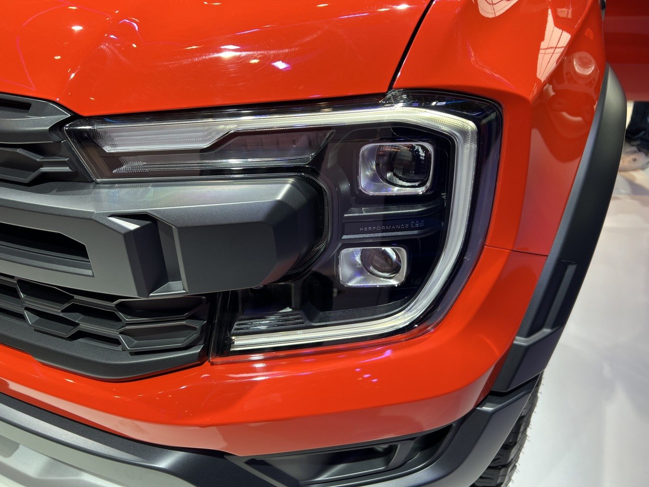 LED performance headlight and front grille close-up