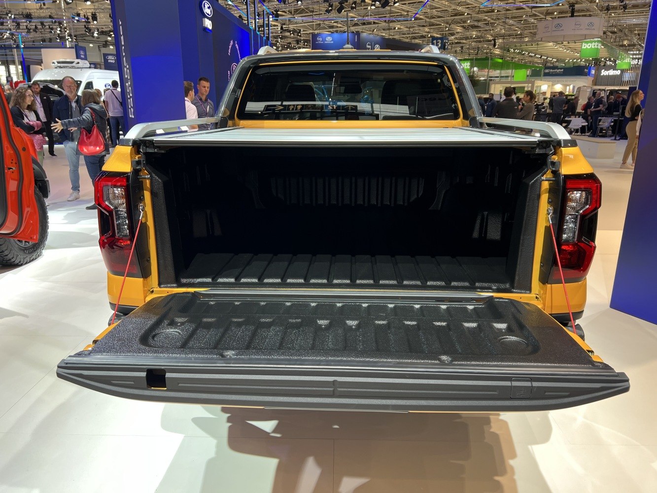 Open cargo bed and lowered tailgate with textured liner
