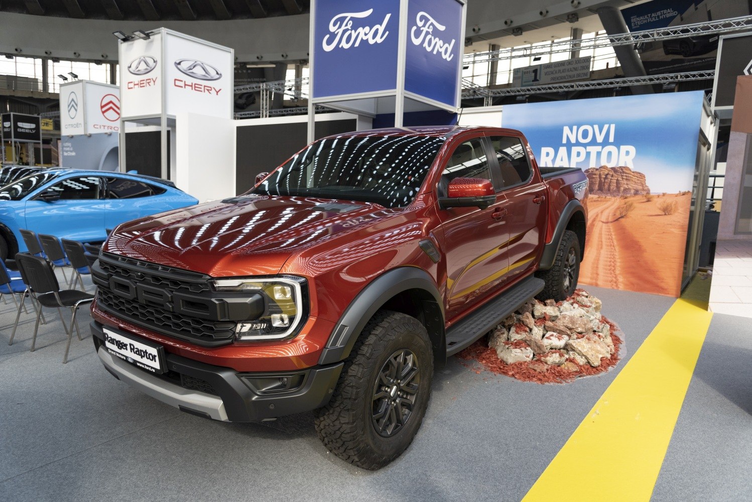 Front grille with bold design and rugged off-road tires on double cab pickup