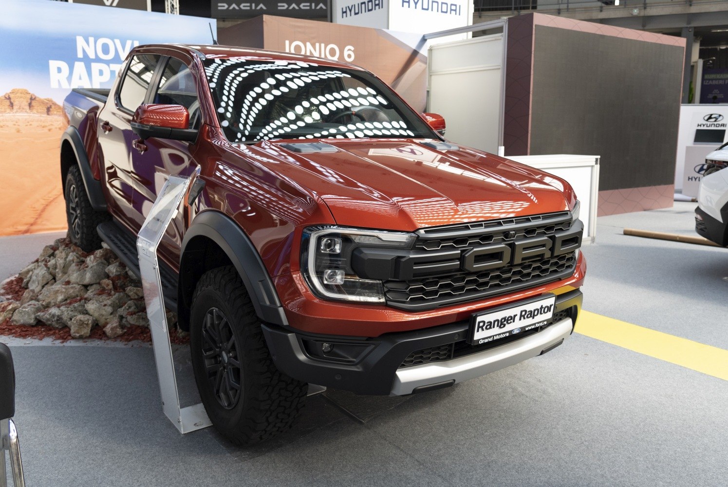 Front view of off-road pickup with rugged grille and large tires