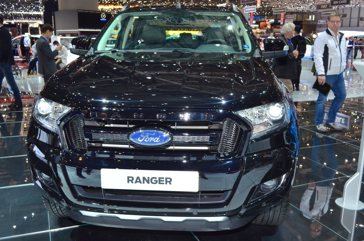 Front view of a pickup truck with prominent grille and headlights
