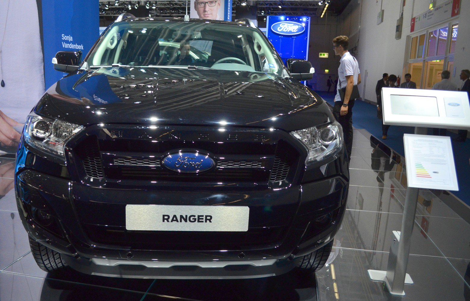 Front view of a rugged pickup truck grille and headlights