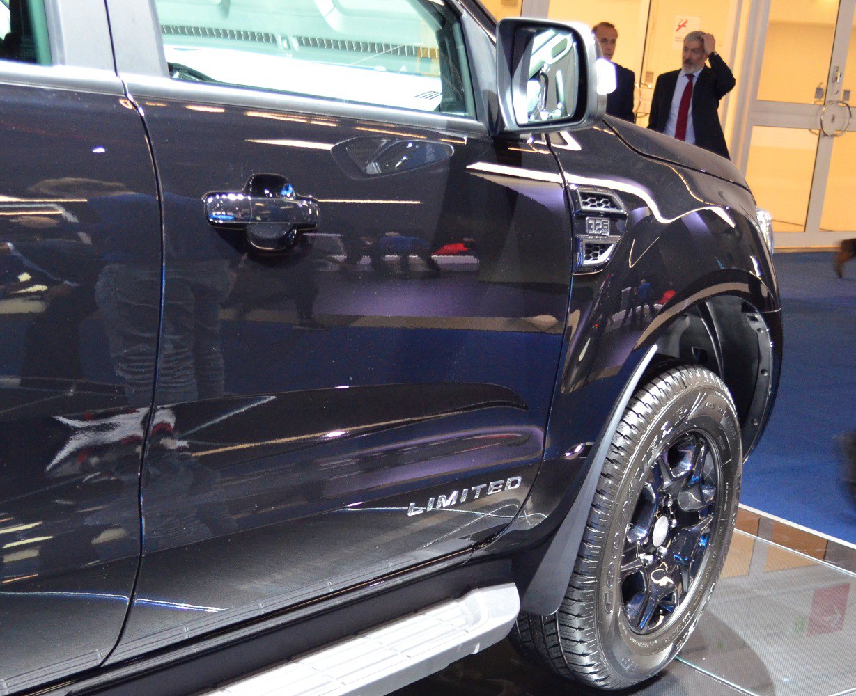 Close-up of side door, side vent, and wheel of a Limited edition pickup.