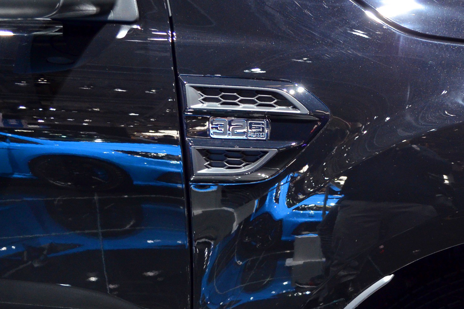 3.2L engine badge and hexagonal side vent on truck door