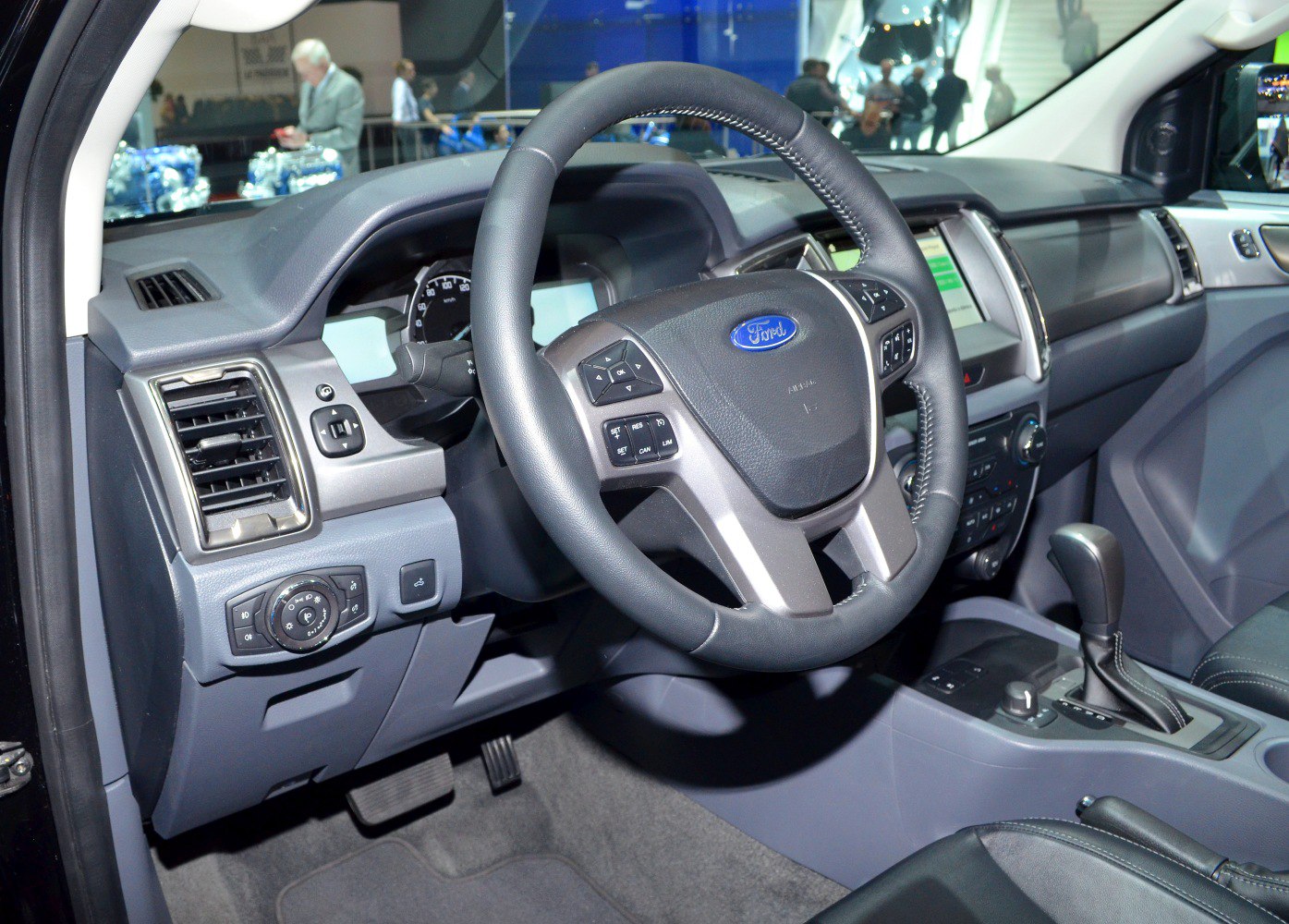 Dashboard and steering wheel with control buttons