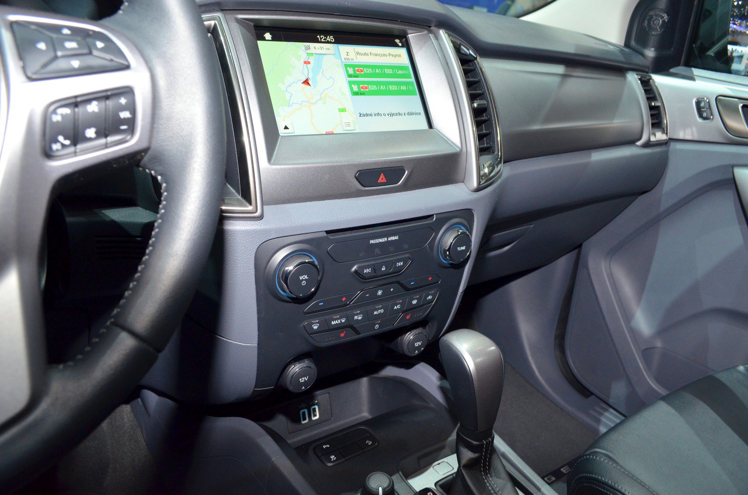 Dashboard with touchscreen navigation and climate control