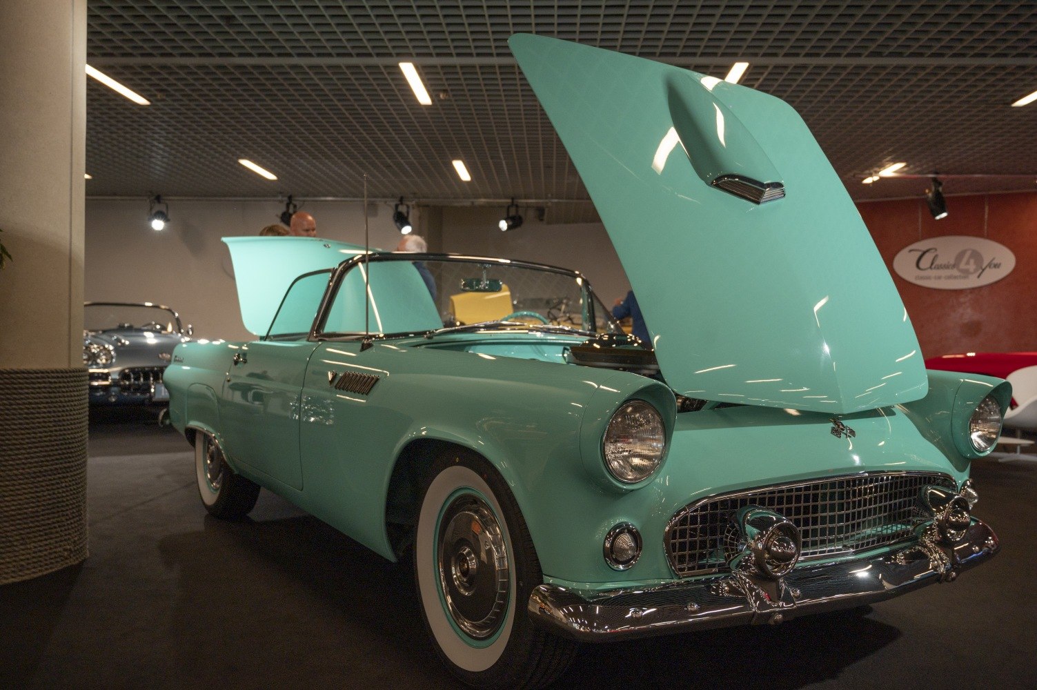 Vintage convertible with hood open and classic 1950s design