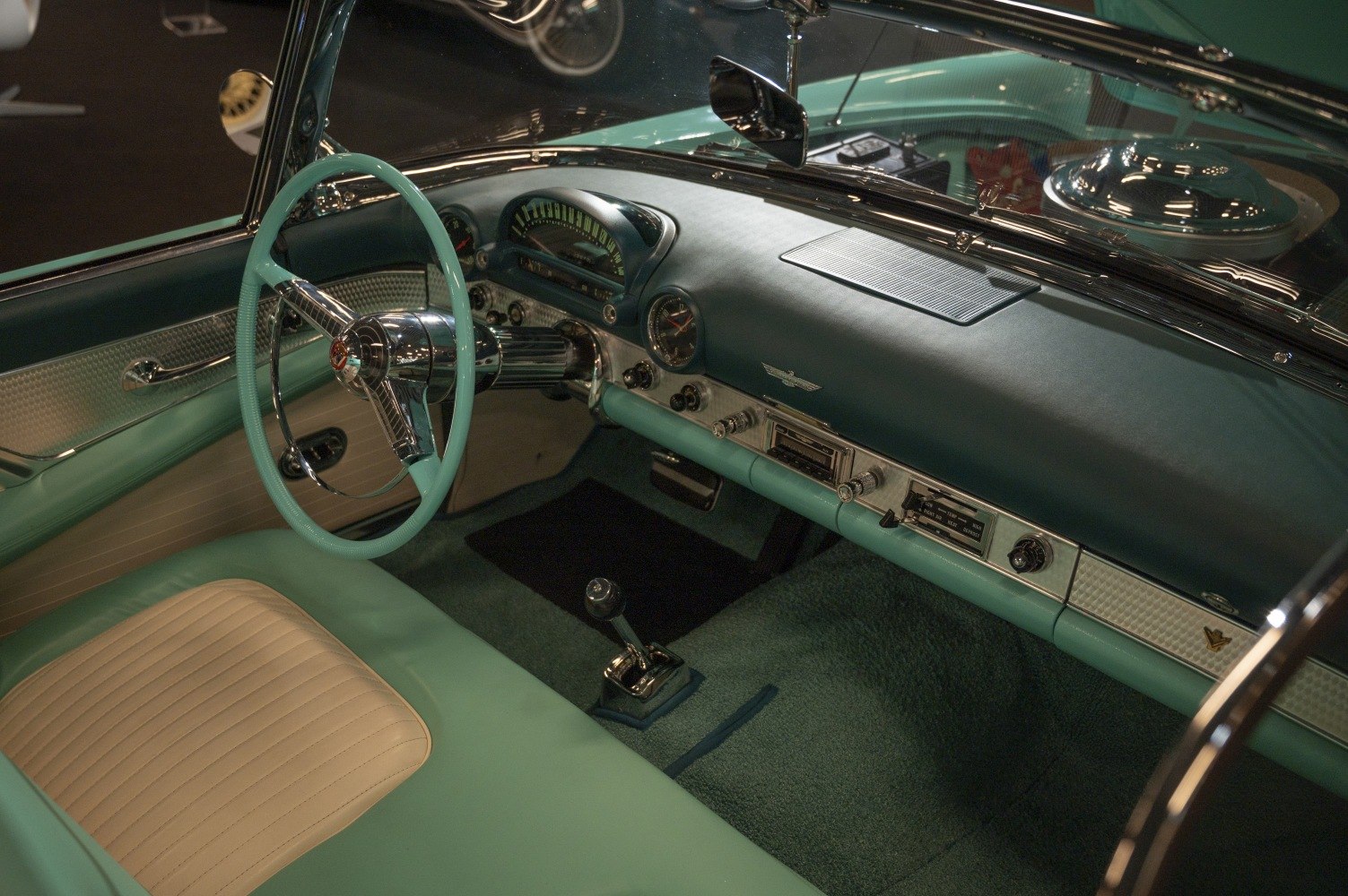 Vintage car interior with retro dashboard and manual gear shift