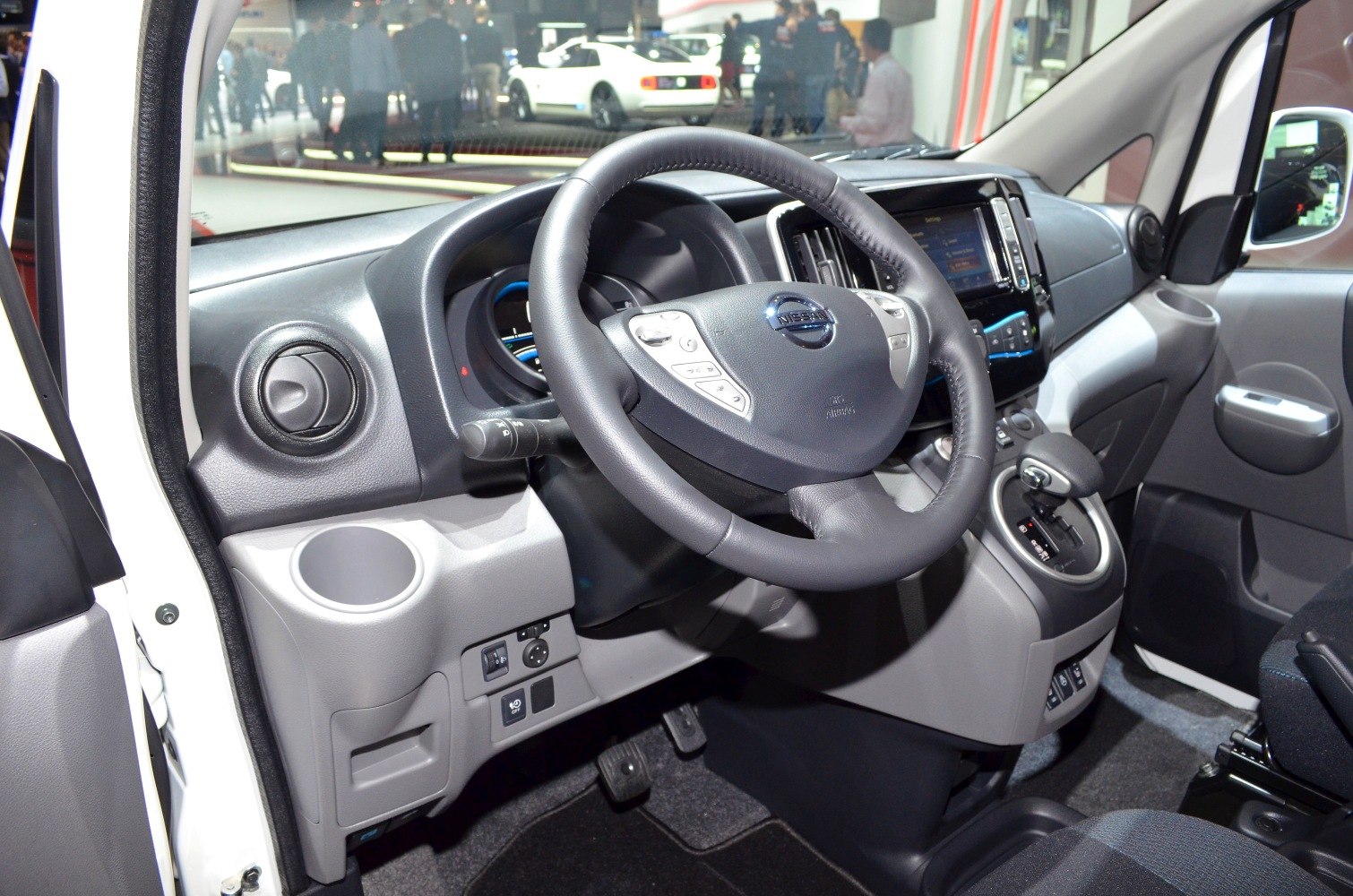 Steering wheel and digital dashboard with center console in vehicle interior