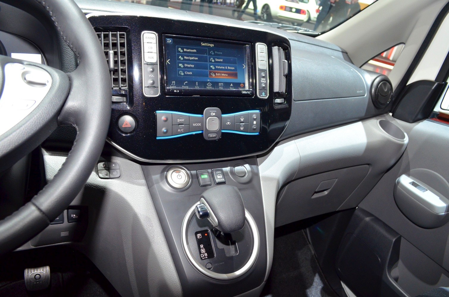 Modern dashboard with touchscreen infotainment and electronic gear selector