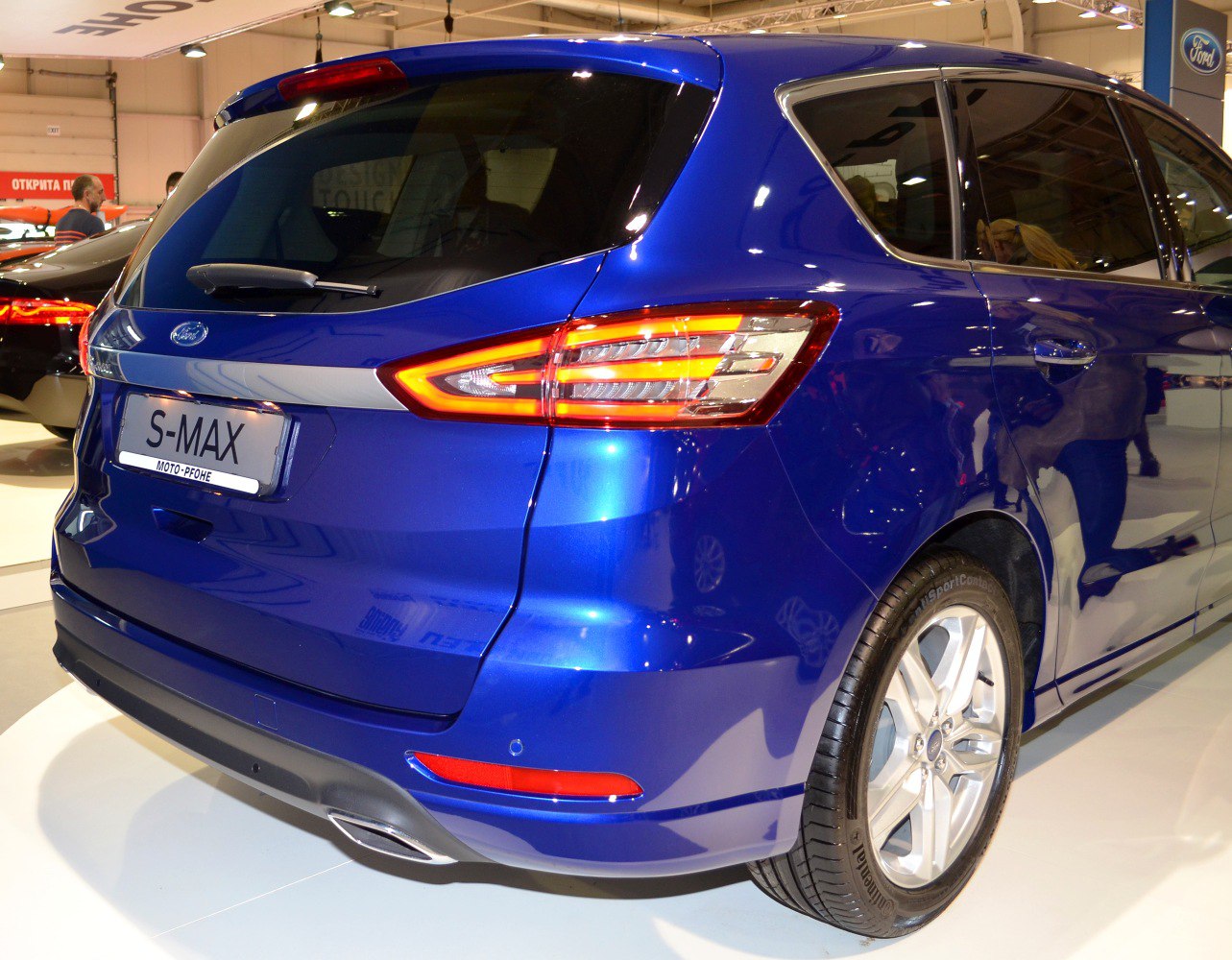 Rear design and illuminated taillights of a modern SUV.