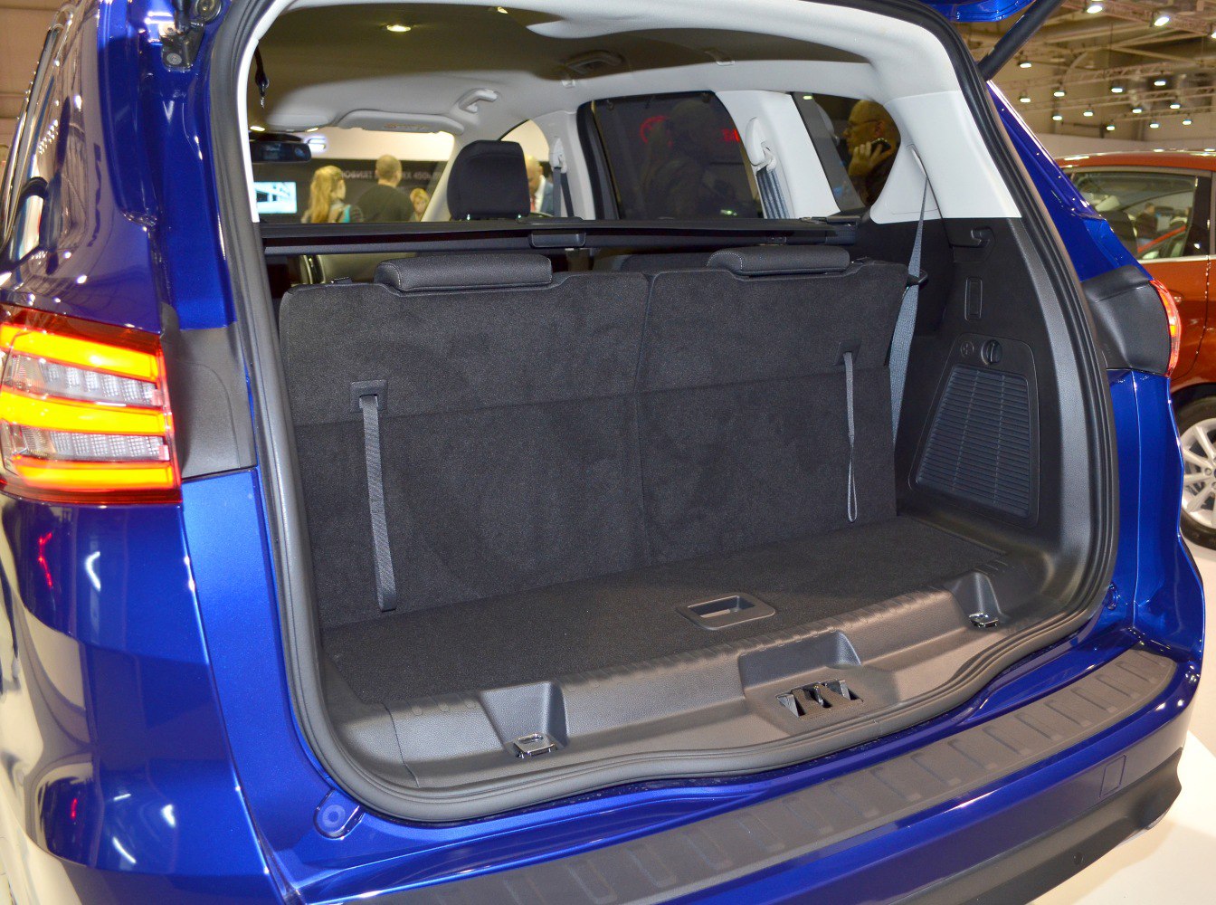 Folded third row seats creating large rear cargo space