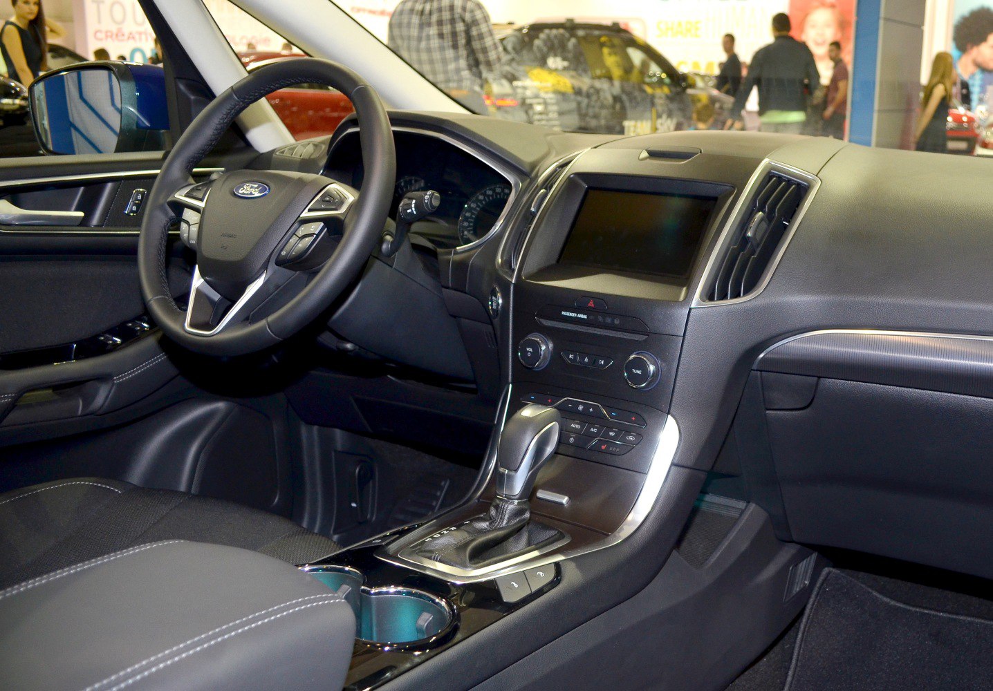 Modern car interior with dashboard and steering wheel