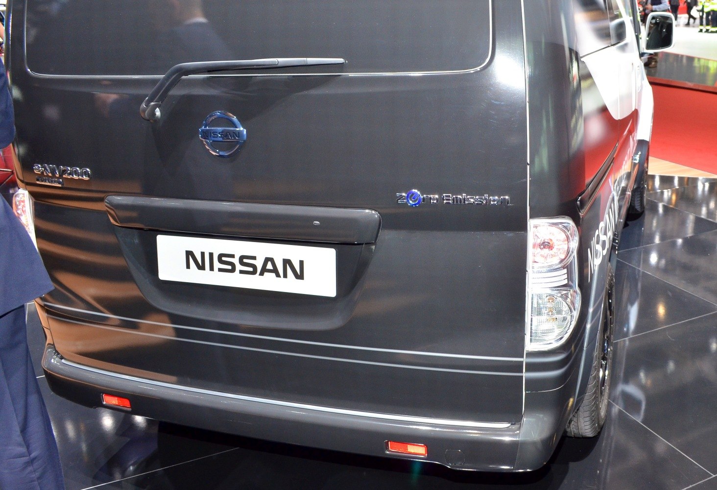 Rear view of electric van with zero emission badge and Nissan logo