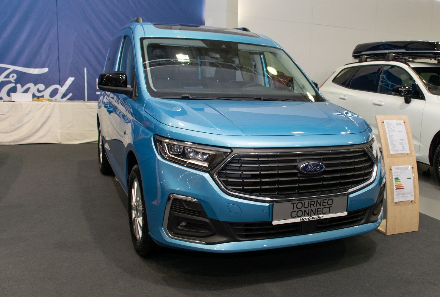Front view with sleek grille and LED headlights