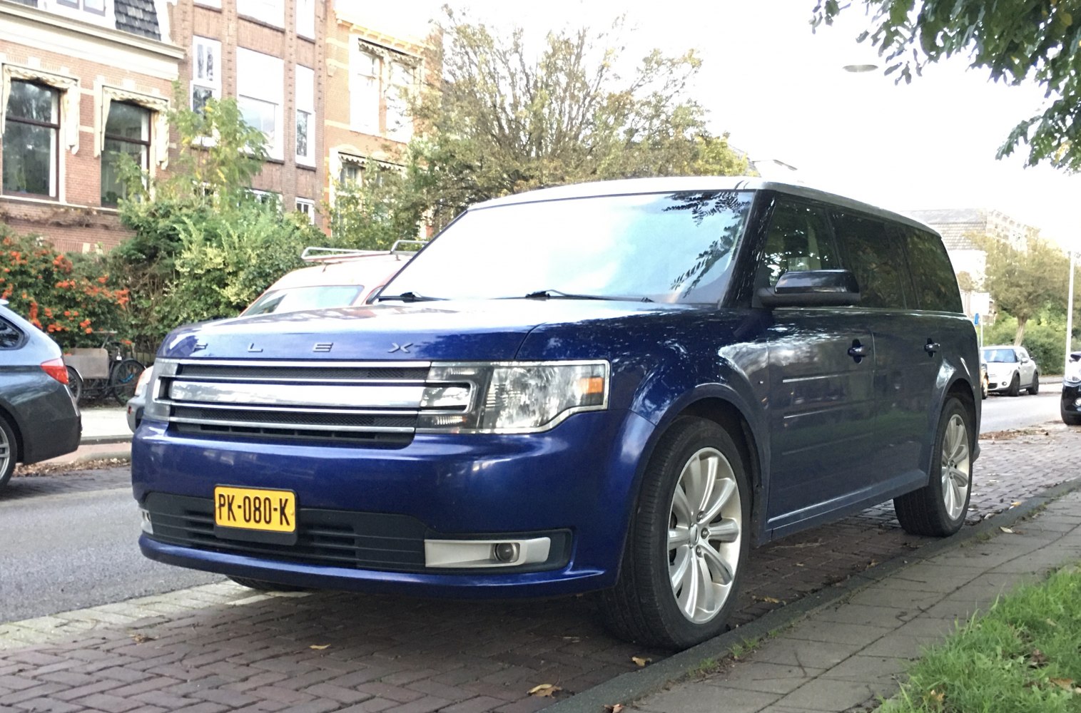 Boxy SUV with prominent front grille and side profile