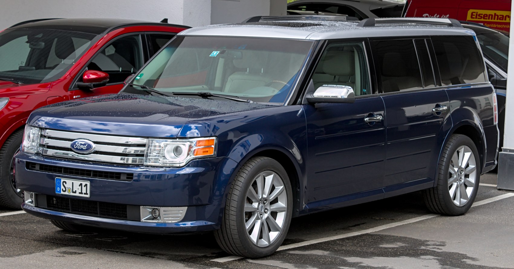 Blue Ford SUV with silver roof and chrome accents