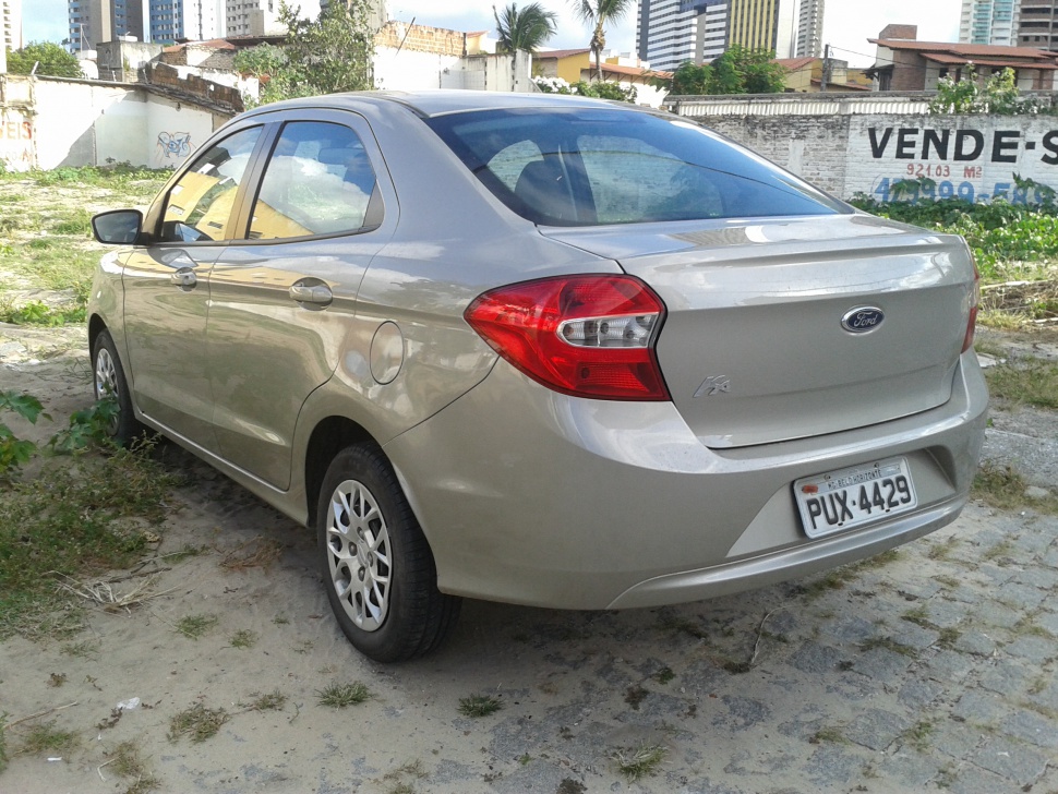 Rear and side exterior view showing tail lights and door design