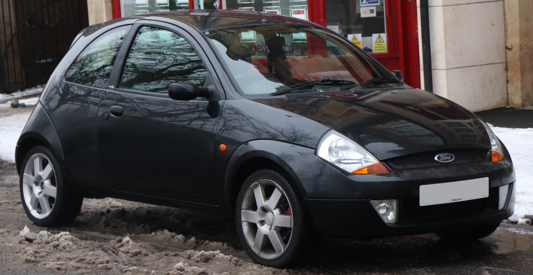 Compact hatchback with sporty alloy wheels and aerodynamic front design