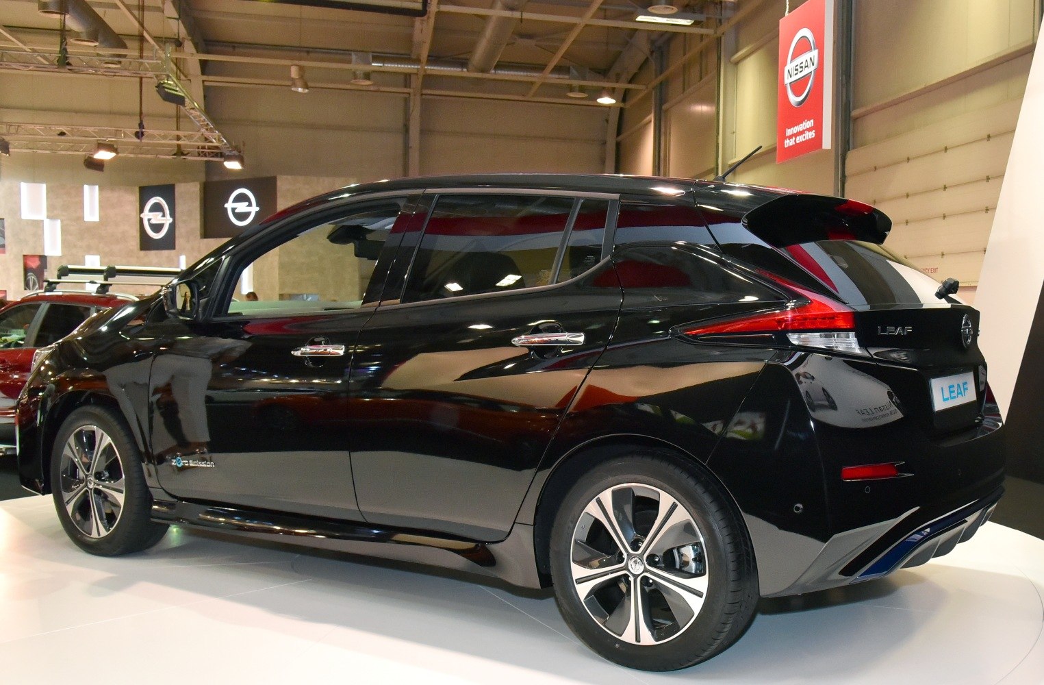 Black electric hatchback with distinctive rear design and alloy wheels