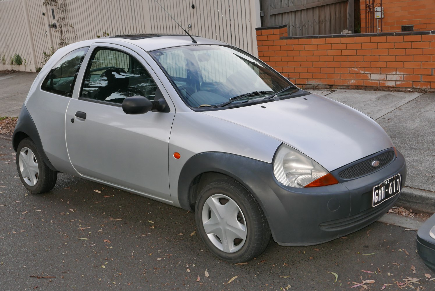 Compact hatchback with unique rounded front and plastic wheel covers