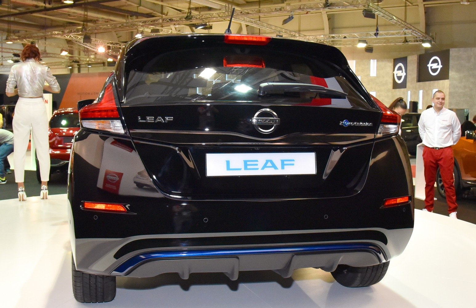 Rear view of electric hatchback with taillights and zero emission badge