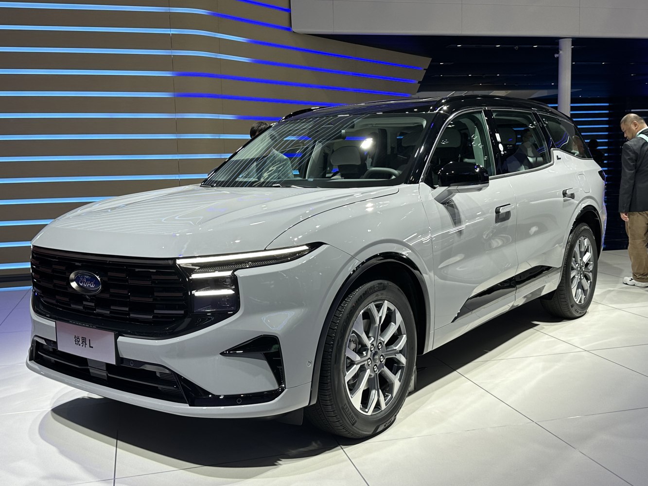 Front three-quarter view showcasing LED headlights and sleek SUV design.