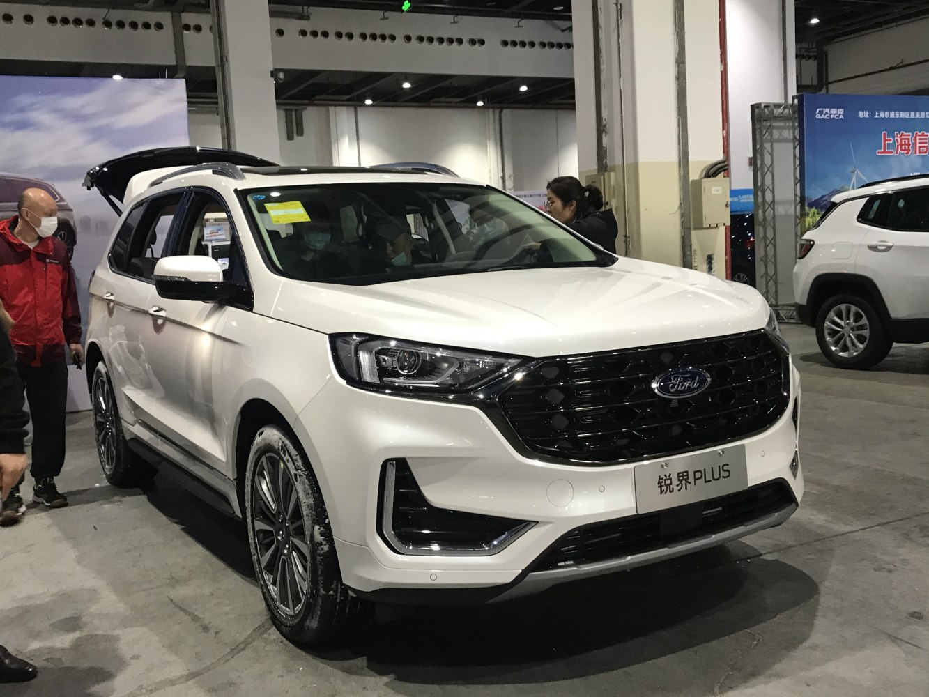 Front view with black grille and LED headlights