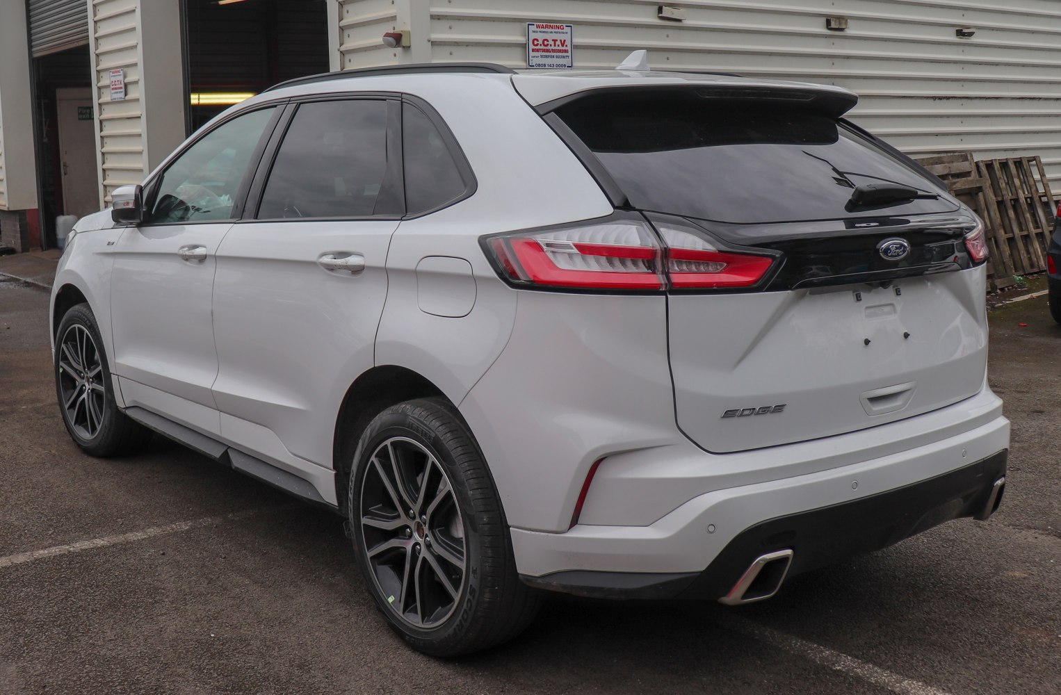 Rear view of SUV with LED tail lights and dual exhaust tips