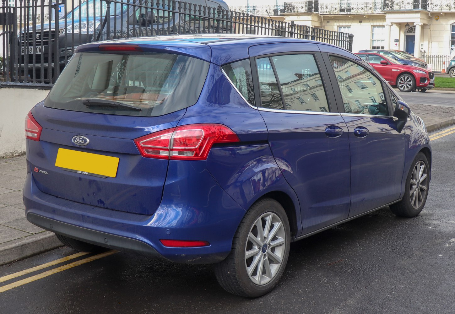 Rear and side view with tail lights and sliding rear doors