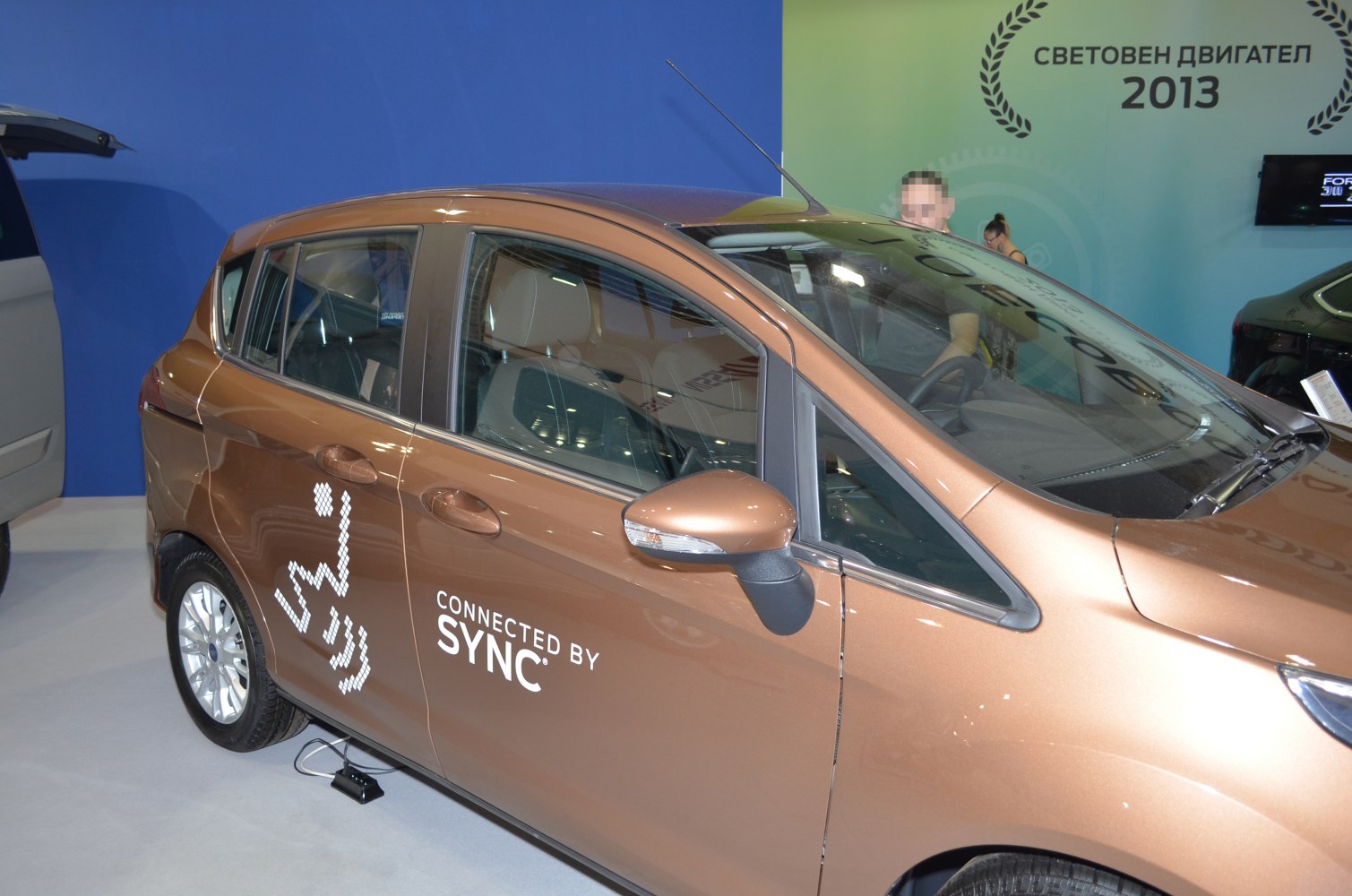 Compact multi-door car side view with SYNC connectivity