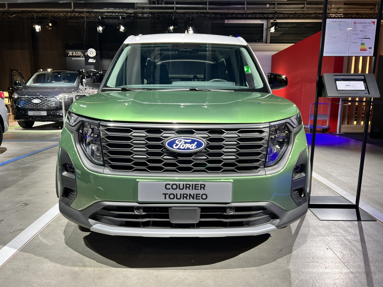 Front view with hexagonal grille and distinctive headlights