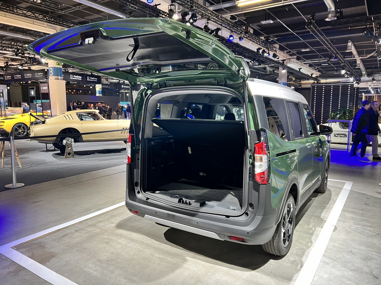 Rear cargo area and open tailgate of a modern passenger van