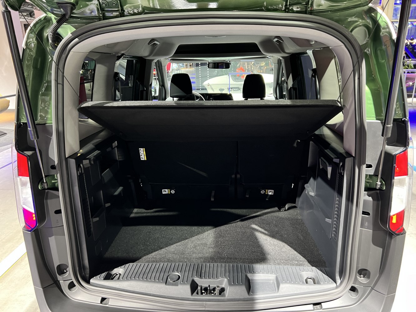 Rear cargo space with storage cover and spacious interior