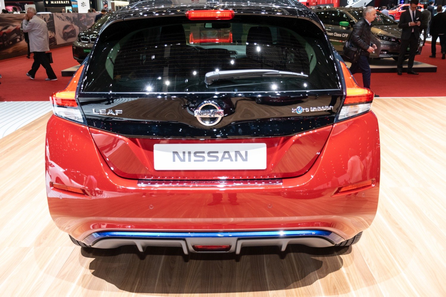 Rear view of electric hatchback with distinctive taillights and black rear hatch glass
