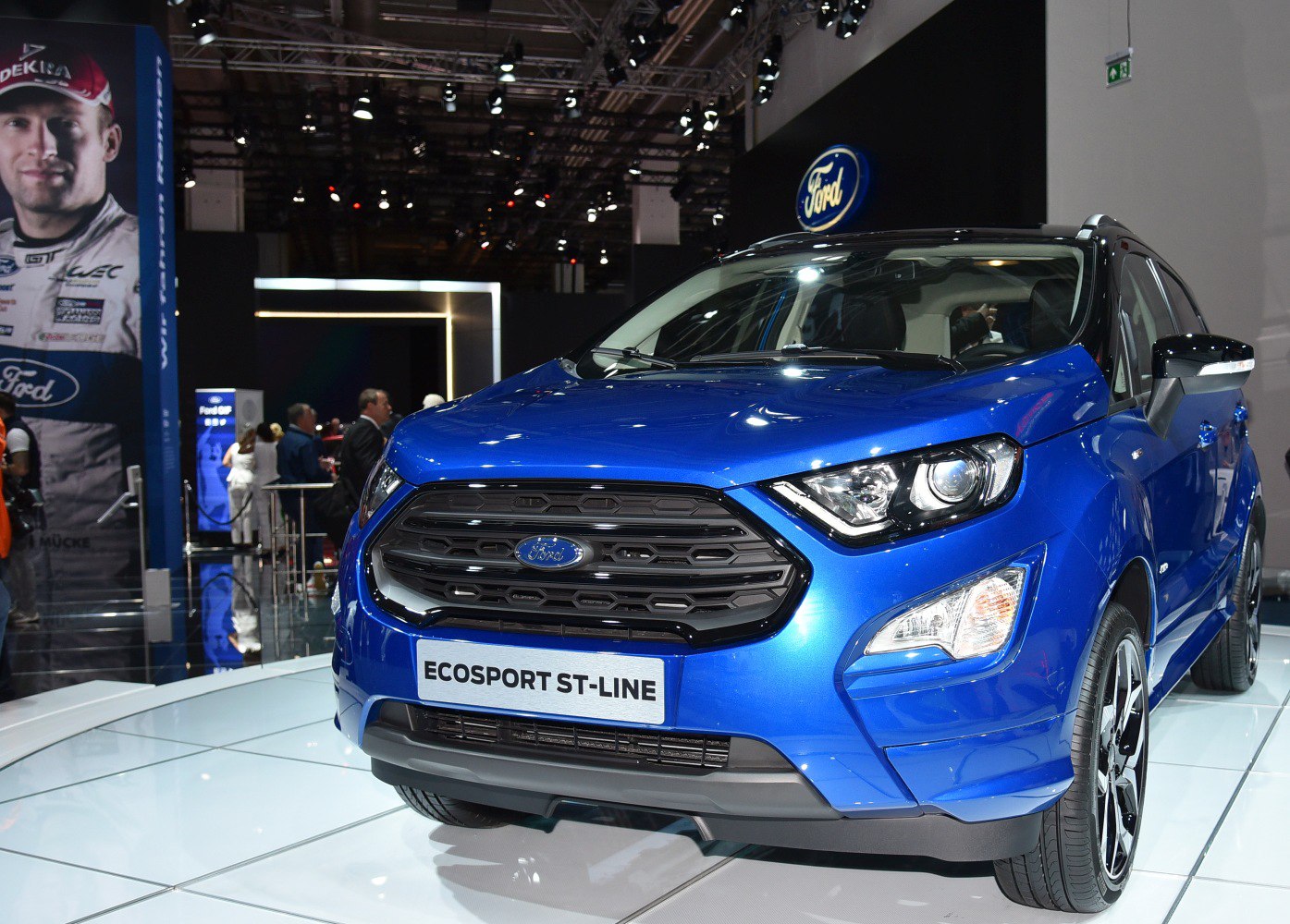 Bold front grille and sharp LED headlights in blue compact SUV