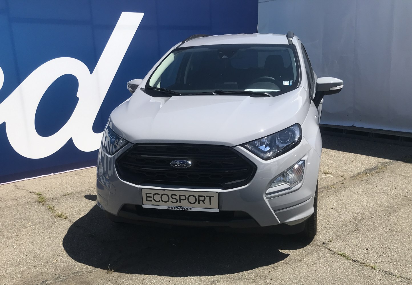 Front view of compact SUV with hexagonal grille and modern headlights